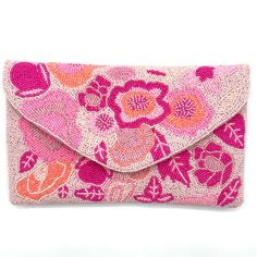 "This beautiful Pink Floral Beaded Bag is a must-have for every girl this season. This stylish clutch will make the perfect birthday gift and/or wedding gift. Handcrafted and finished with a decorative magnetic clasp, and has an optional silver chain strap for use as a crossbody purse. This pink purse clutch bag for women is the perfect complement to any outfit. The intricate beadwork makes this a one-of-a-kind piece that anyone would be proud to have. With custom beaded detail, this purse is pe Pink Beaded Clutch For Party, Pink Beaded Party Clutch, Spring Clutch Evening Bag As Gift, Spring Clutch Evening Bag, Spring Clutch Evening Bag For Gift, Summer Beaded Clutch As Gift, Spring Beaded Bag Gift, Spring Beaded Bags Perfect For Gifts, Spring Beaded Bag As Gift