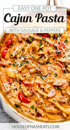 easy one pot cajun pasta with sausage and peppers in a white casserole dish