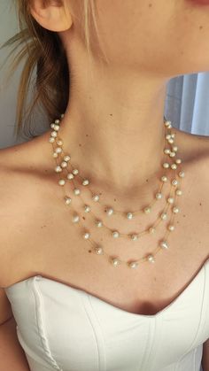 One of a kind three layer stainless steel necklace with gold color chain and fresh water pearls. Stainless steel chain with baroque bead 5-6mm Necklace of approximately 55cm long layer / 50cm middle layer / 45cm short layer, stainless steel clasp and extension chain of 6cm. Can be paired with earrings S-G-021 ✦This is a perfect gift for yourself or someone you love. ✅ Please take note of the sizes and dimensions as they may appear larger or smaller in photos, on certain monitors or computers. As Gold Layered Necklace With Pearl Chain For Party, Double Strand Pearl Layered Necklace Gift, Double Strand Pearl Layered Necklace As Gift, Double Strand Pearl Layered Necklace For Gift, Party Layered Pearl Necklace With Pearl Chain, Elegant Gold Layered Necklace With Pearl Charm, Multi-strand Pearl Necklace As Gift, Double Strand Pearl Chain Necklace For Party, Multi-strand Pearl Necklace Chain As Gift