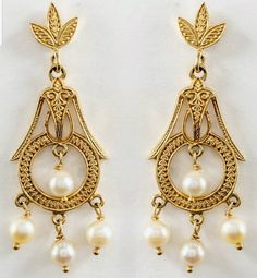 Pair of 14K yellow gold earrings that feature saltwater cultured pearl dangles, attached with 14K yellow gold. Repousse Leaf engravings all over the design of the earrings. Posts with 14K yellow gold butterfly backs. Each pearl measures 4.00 mm. Each earring measures 1.70 inches long and 16.00 mm wide. The pair of 14K yellow gold saltwater cultured pearl earrings weigh 7.60 grams. The pair of 14K pearl earrings are identified, tested and described by a Graduate Gemologist, GIA. The pair of earri Classic Gold Chandelier Earrings For Anniversary, Luxury Gold Pearl Drop Chandelier Earrings, Luxury Gold Chandelier Earrings With Pearl Drop, Elegant Yellow Gold Pierced Danglers, Elegant Yellow Gold Hallmarked Danglers, Elegant Hallmarked Yellow Gold Danglers, Elegant Yellow Gold Danglers, Yellow Gold Pearl Drop Dangle Chandelier Earrings, Traditional Pierced Pearl Earrings For Formal Occasions