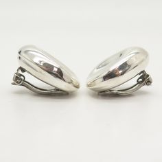 925 Sterling Silver Vintage Mexico Concave Hollow Clip On Earrings Weight: 16.9g WELCOME TO PAWN SHOP We are an actual pawn shop and have been in business for over 25 years. Since 1990, our establishment has been serving a variety of clients by providing them with short term cash solutions and options of liquidity regarding their treasured heirlooms. Acknowledging that today′s customers are very sophisticated and are looking for a variety of investments, our acquisitions are hand-picked for our Sterling Silver Clip-on Earrings With Polished White Gold Finish, Clip-on Sterling Silver Jewelry In White Gold, Sterling Silver Clip-on Jewelry In White Gold, Classic Silver Clip-on Earrings, Classic Sterling Silver Earrings With Polished Finish, Classic Silver Clip-on Hoop Earrings, Classic Polished Finish Clip-on Earrings For Anniversary, Classic Polished Clip-on Earrings For Anniversary, Classic Clip-on Drop Earrings