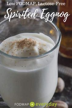 a close up of a drink in a glass with the words low fodmap lactose - free spirited eggnog