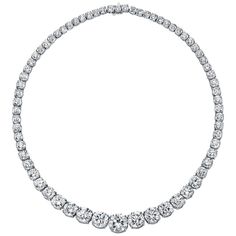 Incredible diamond graduated riviera diamond necklace crafted in hand made platnium, showcasing 68 extraordinary ideal round brilliant cut diamonds, each stone individually graded by the GIA. weighing 54.09 total carat weight, diamonds range DEFG color vvs-vs clarity. Center stone is a sparkling 3.01 carat diamond graduating to 2.51 carat diamonds on either side, continuing down to 2.17 carat and 2.13 carat etc. The craftsmanship on this necklace is just as impressive, the graduating diamonds ar Riviera Necklace, Desert Mirage, White Diamond Necklace, Rare Diamond, Necklaces Choker, The Bling Ring, Vintage Choker Necklace, Vintage Choker, Celestial Necklace