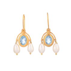 Blue Topaz & Pearl Vermeil 14K Gold Over Sterling Silver Earring 925 Silver = 3.90 gm. Blue Topaz & Pearl = 5.80 ct. Topaz is the birthstone for December and is a symbol of eternal romance and friendship. Pearl is the birthstone for June and is a symbol of good fortune and strength. The beautiful earring measures to be 1.35 inches long including the wire and 0.70 inches wide at its maximum points. The earrings have been made by a team of highly trained and skilled artisans. What is Vermeil 14K G Gold Oval Blue Topaz Earrings, Classic Gold Earrings With Blue Topaz, Classic Yellow Gold Blue Topaz Earrings, Classic Blue Topaz Yellow Gold Earrings, Silver Earring, Beautiful Earrings, Blue Topaz, Sterling Silver Earrings, Birthstone