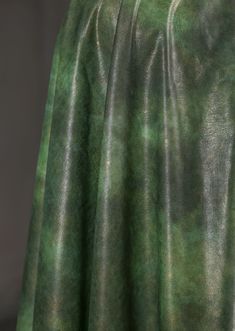 a close up view of a green skirt