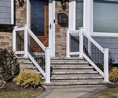 a house with steps leading up to the front door