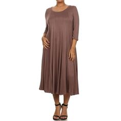 Discover the perfect blend of style and comfort with our Plus Size Casual Midi Dress. Designed for the modern woman, this dress features a flattering A-Line silhouette that gracefully skims your curves, providing a loose and comfortable fit. Made from soft jersey knit fabric, it offers stretch and breathability, making it ideal for all-day wear. The 3/4 sleeves add a touch of elegance and are perfect for transitioning seasons. Whether you're headed to the office, a casual brunch, or an evening o Midi Skirt Casual, Solid Midi Dress, Moa Collection, Midi Dress Casual, Plus Size Activewear, Trendy Style, Cooler Weather, Solid Dress, Women Skirts Midi