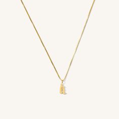 Whether you wear your loved one’s initial or your own, this dainty initial necklace is a chic way to personalize your neck stack. The Old English initial hangs on a box chain that reflects all the light. A thoughtful piece for you or any person in your life. 14k Gold Fill Letter: 1/2” x 1/4” Length: 16" + 2" Ext. Make your jewelry last! Click here for jewelry care. Need a gift box? We got you. Tan Initial Pendant Necklace, Initial Pendant Charm Necklace Gift With Box Chain, Gift Initial Pendant Charm Necklace With Box Chain, Tan Initial Pendant Charm Necklace, Gift Pendant Initial Necklace With Box Chain, Minimalist Box Chain Initial Necklace As Gift, Everyday Tan Initial Pendant Charm Necklace, Trendy Initial Pendant Necklace With Delicate Chain, Initial Pendant Necklace With Box Chain As Gift