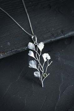 ITEM DESCRIPTION: The size H 5 cm x W 3 cm (2 x 1 inch). Weight - 3 g. Maidenhair fern is gentle and very beautiful plant. So it inspired me to create this unusual plant necklace. It looks natural and elegant at the same time. I made it of sterling silver and peridot. Tiny leaves repeat the natural shape and texture. This jewelry will not go unnoticed and will bring you many compliments. Ooak jewelry made by eco-friendly materials. This handmade necklace will come to you in a gift box - ready fo Plant Necklace, Forest Necklace, Maidenhair Fern, Fern Leaf, Soldering Jewelry, Unusual Plants, Dragon Pendant, Leaf Pendant, Silver Pendants