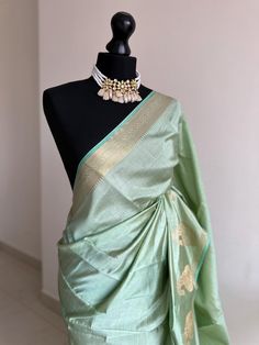 Introducing our exquisite new addition from the  T U S S A R collection: a delicately woven tussar silk saree, luxuriously soft to the touch. Unlike typical tissue, this fabric drapes effortlessly and forms elegant pleats with ease. Its subtle sheen and refined lustre are perfectly complemented by a copper border.  *Available in other colours Green Raw Silk Pre-draped Saree With Self Design, Green Slub Silk Pre-draped Saree For Diwali, Green Semi-stitched Tussar Silk Blouse Piece, Designer Green Katan Silk Pre-draped Saree, Elegant Green Cotton Silk Saree, Green Slub Silk Blouse Piece With Zari Work, Designer Tussar Silk Blouse Piece In Pista Green, Designer Pista Green Tussar Silk Blouse Piece, Green Slub Silk Blouse For Festivals