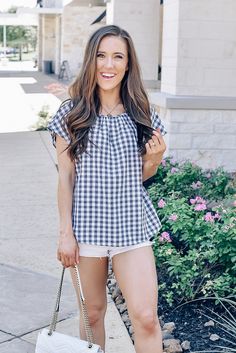 Enjoy the sun in this easy and lightweight gingham top in charcoal. We love this top paired with white denim shorts for a cute and casual look. Gingham top in charcoal Short sleeves Loose fit Runs true to size Piper is 5'3, wears a size 2 and is wearing a Small! Summer Gingham Blouse For Picnic, Summer Plaid Blouse For Picnic, Summer Plaid Blouse For Day Out, Short Sleeve Gingham Blouse For Day Out, Summer Plaid Tops For Day Out, Plaid Summer Tops For Day Out, Spring Plaid Tops For Everyday, Summer Plaid Relaxed Fit Blouse, Summer Plaid Blouse With Relaxed Fit