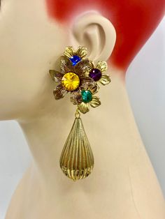 "Amazing vintage 80's! Excellent vintage condition. 3 1/4\" Clips are secure! New old stock!" Vintage Flower Charm Dangle Earrings, Vintage Metal Flower Earrings, Vintage Drop Flower Earrings For Party, Vintage Flower Drop Earrings For Party, Vintage Blue Flower Earrings, Vintage Multicolor Drop Clip-on Earrings, Vintage Metal Dangle Flower Earrings, Vintage Dangle Earrings With Flower Charm, Vintage Dangle Flower Earrings For Party