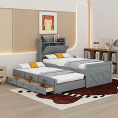 two twin size beds with storage drawers in a modern style bedroom, one is made from wood and the other is painted gray