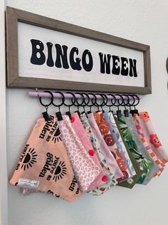 there is a sign that says bingo ween hanging on the wall