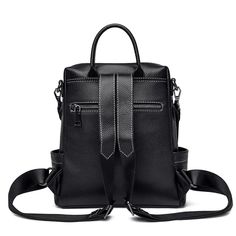 Elevate your style with our Women's Leather Backpack - a blend of high-quality soft leather and chic design. Perfect for school or leisure travel, this backpack exudes sophistication and practicality. Embrace the large capacity and timeless black hue, making it the ideal companion for fashionable individuals. Main Material: Genuine Leather Lining Material: nylon Interior Zipper Pocket Interior Compartment Exterior: Silt Pocket Black Faux Leather Backpack For On-the-go, Large Capacity Leather Backpack For School, Large Capacity Leather Backpack For Back To School, Black Faux Leather School Backpack, Black Faux Leather Backpack For Travel, Black Faux Leather Travel Backpack, Modern Large Capacity Leather Backpack For Back To School, Black Faux Leather Backpack For School, Back To School Leather Shoulder Bag