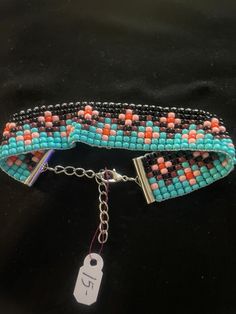 This beaded bracelet measures 3/4" wide by 6 1/2"  with beadwork then a chain-link closure for adjustability Loom Jewelry, Little Flowers, Beaded Bracelet, Chain Link, Bead Work, Loom, Nasa, Labour Day, Beading