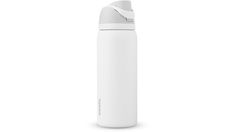 thermos bottle is white and has a plastic lid