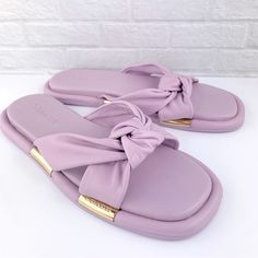 New! Coach Brooklyn Leather Violet Lilac Twist Knot Slip-On Sandals Size 7.5 New Without Box Or Tags 100% Authentic Guaranteed! Size: 7.5 (Runs Large) Color: Violet Lilac *Color May Look Slightly Different Due To Lighting! Details: Leather Upper Leather Lining And Footbed Rubber Outsole Slip On Brand New, Unworn Or Used. May Have Minor Imperfections Such As Minor Scratches On Leather As Well As A Tiny Peeling Near The End Of Sole From Store Display, See Pictures. Please Review All Pictures For Better Description! Coach Open Toe Sandals For Spring, Coach Casual Slip-on Sandals, Coach Sandals For Spring Vacation, Coach Sandals For Beach In Spring, Coach Sandals For Vacation With Round Toe, Coach Open Toe Sandals For Vacation, Coach Sandals For Vacation, Coach Closed Toe Beach Sandals, Coach Flat Heel Sandals For Summer