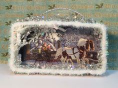 a christmas card with horses pulling a sleigh