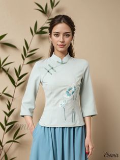 Eromis - Vintage Chinese Style Embroidered Tang Suit with 3/4 Sleeve, Exclusively Designed for Womens Clothing Embroidered Stand Collar Blouse For Spring, Embroidered Blouse With Stand Collar For Spring, Embroidered Spring Blouse With Stand Collar, Spring Embroidered Blouse With Stand Collar, Spring Floral Embroidered Half Sleeve Top, Floral Embroidered Top With 3/4 Sleeves For Spring, Embroidered Short Sleeve Spring Sets, Embroidered Short Sleeve Sets For Spring, Spring Floral Embroidered Top With 3/4 Sleeve