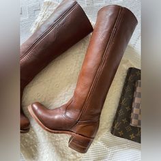 Circa 1970’s-1980’s This Pair Of Frye Vintage Campus Boots Are In Excellent Condition And Appear To Have Only Been Worn Once. Rare Pull On Collectors Banana Lining Women’s Size 5 Approximate Measurements: 2” Heel 14.5” Shaft Circumference 15.5” Shaft From Arch Scope Our Shop For More Boots. Classic Vintage Brown Boots, Vintage Vegetable-tanned Leather Boots, Fitted Vintage Boots With Goodyear Welted, Fitted Vintage Boots With Goodyear Welt, Vintage Vegetable-tanned Boots With Round Toe, Vintage Snip Toe Boots With Rubber Heel Cap, Vintage Goodyear Welted Boots For Fall, Vintage Leather-lined Boots For Fall, Vintage Leather Lined Boots For Fall