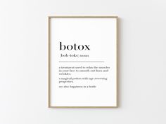 a white framed poster with the words botox in black ink on it's side