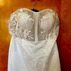 Ordered This On Amazon, Just Wasn’t Exactly What I Thought I Wanted. Tried On Once, Never Worn. Dress Is Ivory, Not Stark White. Thick Satin Lower Layer With 4 Layers Of Tulle Overlay. Sheer Bodice With Boning In Bodice. Small Sequin Detail On Top Half. Sweetheart Neck Line With Cups. Thick Beautiful Lace Through Out. Mermaid Style. Ordered A 18 Fits More Like 14/16. Has Small Train. Fitted Wedding Dress With Illusion And Sweetheart Neckline, White Wedding Dress With Sweetheart Neckline, White Wedding Gown With Sweetheart Neckline, White Strapless Wedding Dress For Bride, White Strapless Bride Gown, White Gown With Sheer Bodice And Sweetheart Neckline, White Lace Bodice Wedding Dress For Bride, White Gown With Illusion And Sweetheart Neckline, White Wedding Dress With Sheer Bodice For Bridesmaid