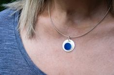 Lapis Lazuli Pendant - Etsy Blue Medallion Jewelry With Polished Finish, Adjustable Sterling Silver Coin Pendant, Adjustable Sterling Silver Coin Pendant Jewelry, Sterling Silver Round Disc Coin Pendant, Blue Coin Pendant Jewelry, Sterling Silver Medallion With Moon Charm, Sterling Silver Moon Charm Medallion Jewelry, Sterling Silver Medallion Jewelry With Moon Charm, Blue Round Pendant Jewelry With Polished Finish