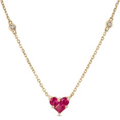 The heart is a universal symbol of love and passion, making the deep red color of this incredible heart-shaped ruby a worthy centerpiece for a necklace made with beautiful 14k yellow gold. Round diamond accents add just the right touch of sparkle for a versatile piece that’s ready for every day and any occasion. Treat yourself or someone special to heartfelt luxury. 14k Gold Gemstone Heart Necklace For Valentine's Day, Ruby Heart Charm Necklace For Anniversary, Heart-shaped Ruby Gemstone Necklace, Ruby Heart Cut Gemstone Necklace, Heart Cut Ruby Gemstone Necklace, Fine Jewelry Ruby Necklace For Valentine's Day, Ruby Birthstone Necklace For Valentine's Day, Valentine's Day Yellow Gold Ruby Jewelry, Valentine's Day Ruby Birthstone Necklace