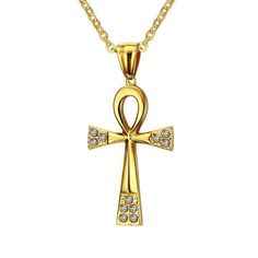 This lovely ankh endant symbol is set in a simple golden design with cubic zircona pieces set at the ends of the pendant. Truly stunning, the ankh is an ancient Egyptian symbol often used to symbolize life. Literally translated as "breath of life", this hieroglyphic is often used in funerary art. The piece itself is made from 316L stainless steel and lpated in a lovely 18K Gold finish. The matching chain extends up to 24" and comes with the 64 mm x 37 mm Innovato Design piece. This accessoy makes a beautiful piece that you can cherish for yourself or ift to a friend.  Product Highlights    Made from 316L stainless steel  Gold-plated finish  Lovely Ankh Pendant Design  Long gold chain necklace Gold Ankh Metal Jewelry, Gold Ankh Shaped Metal Jewelry, Spiritual Ankh Shaped Metal Jewelry, Symbolic Ankh-shaped Metal Jewelry, Symbolic Ankh Shaped Metal Jewelry, Elegant Gold Metal Cross Necklace, Gold Elegant Metal Cross Necklace, Elegant Ankh-shaped Metal Jewelry, Yellow Gold Ankh Necklace