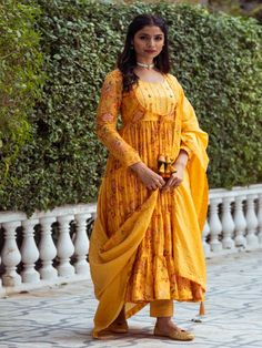 This Set Has a Anarkali, bottom and dupatta. Floral printed tier Anarkali set with hand embroided yoke. It is paired with matching chanderi foil print dupatta enhanced with fabric detailing and palazzo pants. Color: Yellow Fabric: Anarkali - Cotton Silk Bottom - Shantoon Dupatta - Chanderi Product Details: Neck Type - Round neck Anarkali Length - 50 inches Bottom Length - 38-40 inches Sleeve Length - 22 inches Note: Available in other colors The product will be delivered within 2-4 weeks of orde Round Neck Anarkali, Fabric Detailing, Silk Anarkali, Silk Bottoms, Yellow Fabric, Foil Print, Palazzo Pants, Pants Color, Best Deal