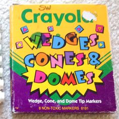 the book crayol weddles, cones and dominos is on the floor