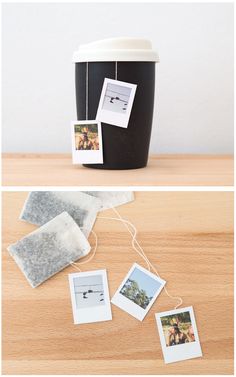 coffee cup with pictures hanging from the side, and two photos attached to it on a string