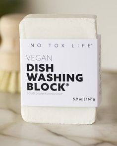 The Dish Block® dishwashing soap is a cleaning powerhouse with a rich, sudsy lather. Cuts stubborn grime and grease on dishes, pots and pans. With added aloe vera to be gentle on your hands. Completely unscented and fragrance-free. You can even use it for cleaning-duty all over your home. Take stains out of laundry, ta Remove Sticky Labels, Natural Odor Remover, Chemical Free Living, Baking Powder Uses, Sticky Labels, Dish Washing, Liquid Dish Soap, Baking Soda Uses, Baking Soda Shampoo