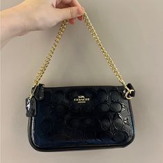 Coach Nolita 19 In Signature Leather (Coach Cv419) Colorgold/Black | Signature Patent Leather | Two Credit Card Slots | Zip-Top Closure, Fabric Lining | Chain Handle With 6 1/4" Drop | 7 1/2" (L) X 4 1/2" (H) X 2" (W)|Style No. Cv419| Coach Nolita 19, Coach Nolita, Nolita 19, Leather Coach, Pretty Bags, Coach Purse, Coach Purses, Zip Top, Gold Black