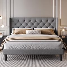 a bedroom with a bed, nightstands and lamps on either side of the bed