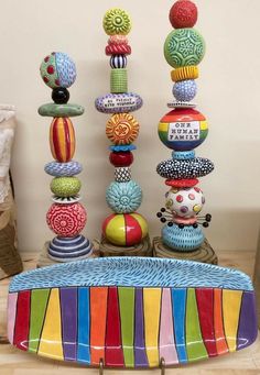 a table topped with lots of colorful balls