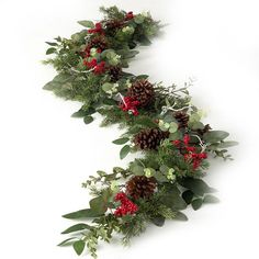 a christmas garland with pine cones and greenery