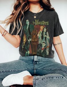 The Munster Tshirt, Halloween Shirt Marvel Tee Shirts, Mary Jane Spiderman Shirt, Spiderman T Shirt Vintage, Spiderman Nyc Shirt, Witch Sisters, Moon Phases Shirt, The Munster, Horror Movie Shirts, Country Music Shirts