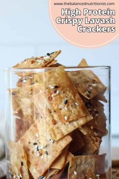 a glass filled with crispy lavash crackers