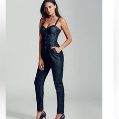 Dark-Wash Denim Jumpsuit Features Bustier Design, Button Detail And Slash Pockets. Back Zipper Closure. Pads Have Been Removed From Bustier Adjustable Straps Bustier Underwire Chic Fitted Denim Jumpsuits And Rompers, Chic High-waist Denim Blue Overalls, Fitted High Waist Denim Jumpsuit For Night Out, Fitted High Rise Denim Blue Overalls, Fitted High-rise Denim Blue Overalls, Fitted Denim Blue Jumpsuit For Work, Fitted Denim Overalls For Workwear, Chic Fitted Denim Jumpsuit Overall, Chic Fitted Denim Jumpsuit