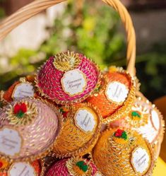 a basket filled with lots of different types of candies on top of a table