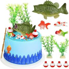 a cake with fish and plants on it