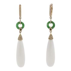 A stylish and chic pair of drop earrings! They feature 27.35 carats of smooth drop-shaped white onyx. Accenting them are 0.41 carats of round brilliant-cut diamonds which add sparkle and brilliance to the piece. Finishing the earrings are two jadeite jade hoops which add length and contrast in color to this unique piece. Made in 18k rose gold and ready to be enjoyed.      Length: 2.5 inches    Weight: 9.2 grams Luxury Drop Earrings With Pave Setting, Luxury Teardrop Earrings With Diamond Accents, Luxury White Drop Teardrop Earrings, Elegant White Drop Diamond Earrings, Luxury Teardrop Earrings With Pave Setting, Luxury White Earrings With Pave Setting, Luxury White Pave Set Earrings, Luxury White Teardrop Earrings, Luxury Teardrop Diamond Earrings