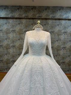 Elegant Long-Sleeve High Neck Beaded Ball Gown with Intricate Embellishments and Luxurious Train - Larosabride's Exclusive High Neck Wedding Dress With Fitted Bodice, Elegant Hand Embellished Dress For Ceremony, Elegant Embroidered Ball Gown With Fitted Bodice, High Neck White Wedding Dress, Embellished Gown With Fitted Bodice For Ceremonies, High Neck White Dress For Wedding, White High Neck Dress For Wedding, Elegant Ball Gown With Intricate Embroidery For Debutante Ball, Elegant Ball Gown For Debutante Ball With Intricate Embroidery