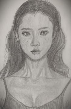 a pencil drawing of a woman's face with long hair and no shirt on