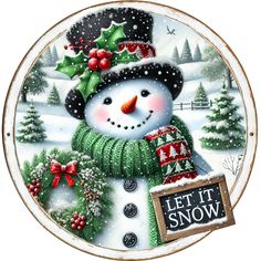 a plate with a snowman wearing a hat, scarf and holly wreath on it