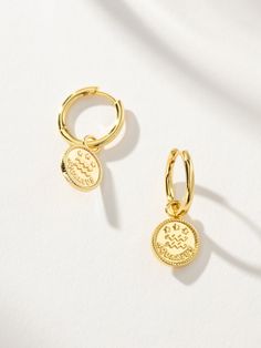 Show off your zodiac sign with these gold textured coin pendant huggies. Stack our Zodiac Huggies with other gold hoop earrings to create your own set or with simple studs to make these your statement earrings. Complete the look:Zodiac Ring Simple Studs, Uncommon James, Zodiac Rings, Jewelry Cleaner, Coin Pendant, Gold Texture, Gold Hoop, Huggies Earrings, Gold Hoop Earrings