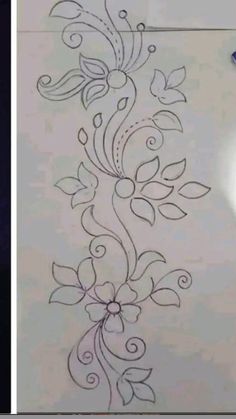 a drawing on the side of a refrigerator freezer next to an image of a flower