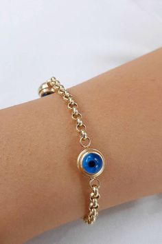 This 14k Gold Evil Eye Bracelet, Evil Eye Rolo Chain Gold Bracelet, 1 3 5 Blue Eyes Real Gold Station Bracelet is Gift for Her gift for Mother Bracelets that on photo are 8.0 mm evil eye bracelet and 9.0 mm evil eye bracelet Material: 14K Solid Gold (Real fine Gold) Gold color: Only yellow gold Available Eye Charm Size: 6 mm eye means ; 6.00 - 6.30 mm 7 mm eye means ; 7.50 - 7.70 mm 8 mm eye means ; 8.50 - 8.70 mm 9 mm eye means ; 9.50 - 9.70 mm 10 mm eye means ;10.20 - 10.30 mm You can customiz Elegant Blue Chain Bracelet As Gift, Elegant Blue Chain Bracelet For Gift, Adjustable Blue Chain Bracelet, Blue Charms Jewelry Gift, Sapphire Jubilee Bracelet, Gold-plated Round Beaded Bracelets As Gift, Gold Plated Beaded Bracelets As Gift, Gold Plated Round Beaded Bracelets For Gift, Round Gold-plated Beaded Bracelets As Gift